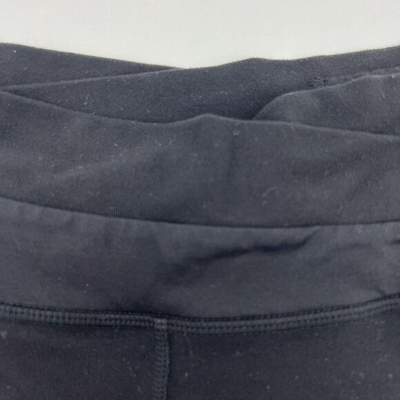 Lululemon Astro Pant Pleated Criss Cross Waist Flare Legging Black, Size 8 - Picture 2 of 5